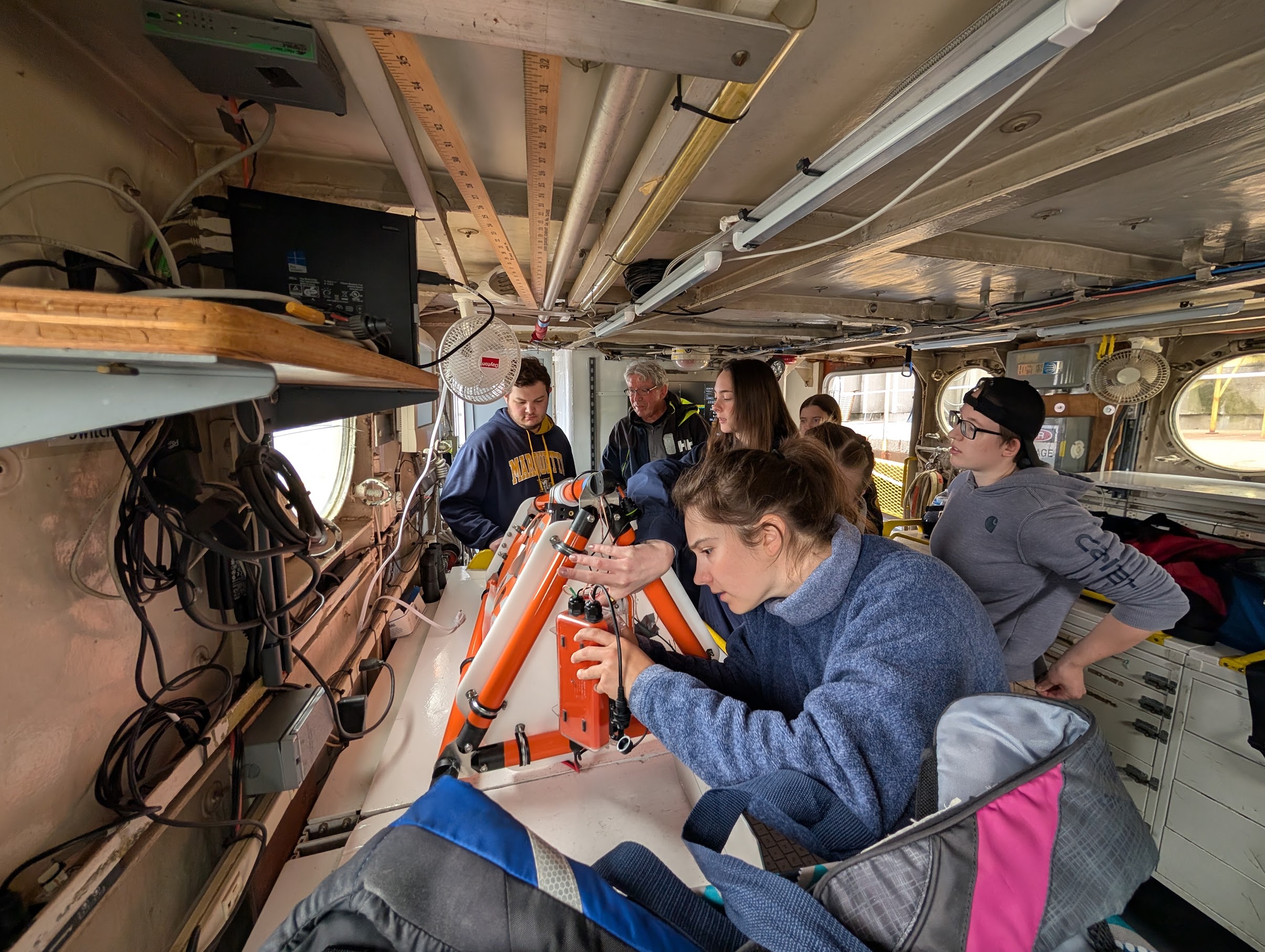 Students working on the buoy electronics